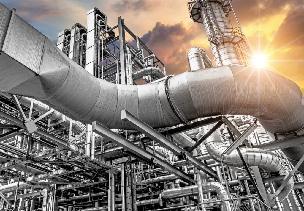 Oil and gas refinery plant form industry petroleum zone,Refinery equipment pipeline steel at sunrise. -image